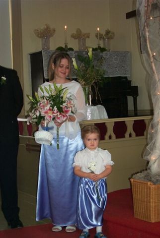 Bridesmaid & flower girl wore matching skirts & white blouses
