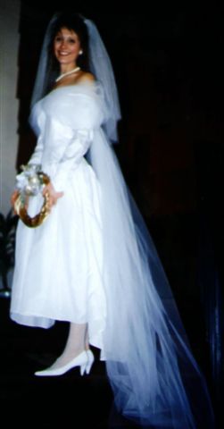 Taffeta gown..shoulder tule also drapes to make train
